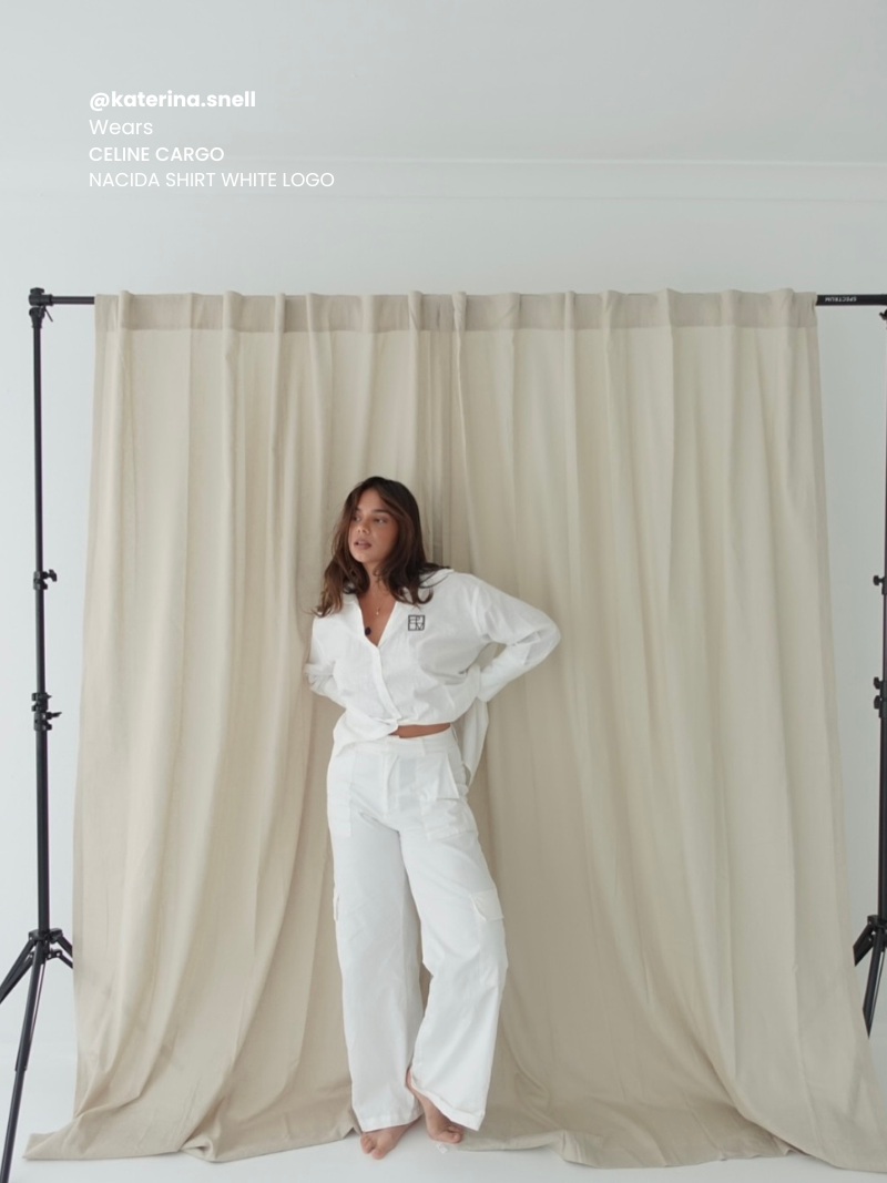 Celine cargo pants white influencer styling Australian boutique resort wear fashion inspiration
