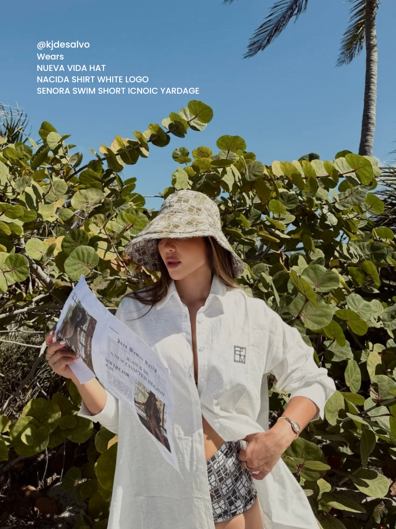 Nueva Vida bucket hat brown influencer styling Australian boutique resort accessories White Lotus inspired
